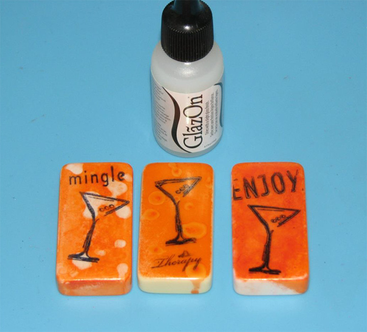Domino tiles colored with StazOn ink and protected with a layer of GlazOn before adding more colors.