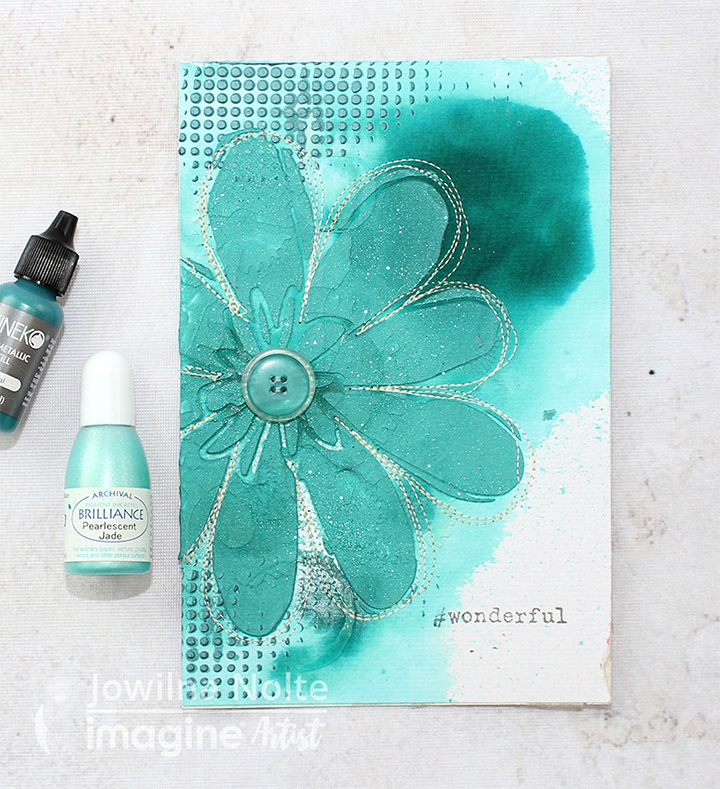 A gorgeaus floral teal card made using brilliance and ultimate metallic inkers from Tsukineko as well as cute embellishements like sewing and a button.