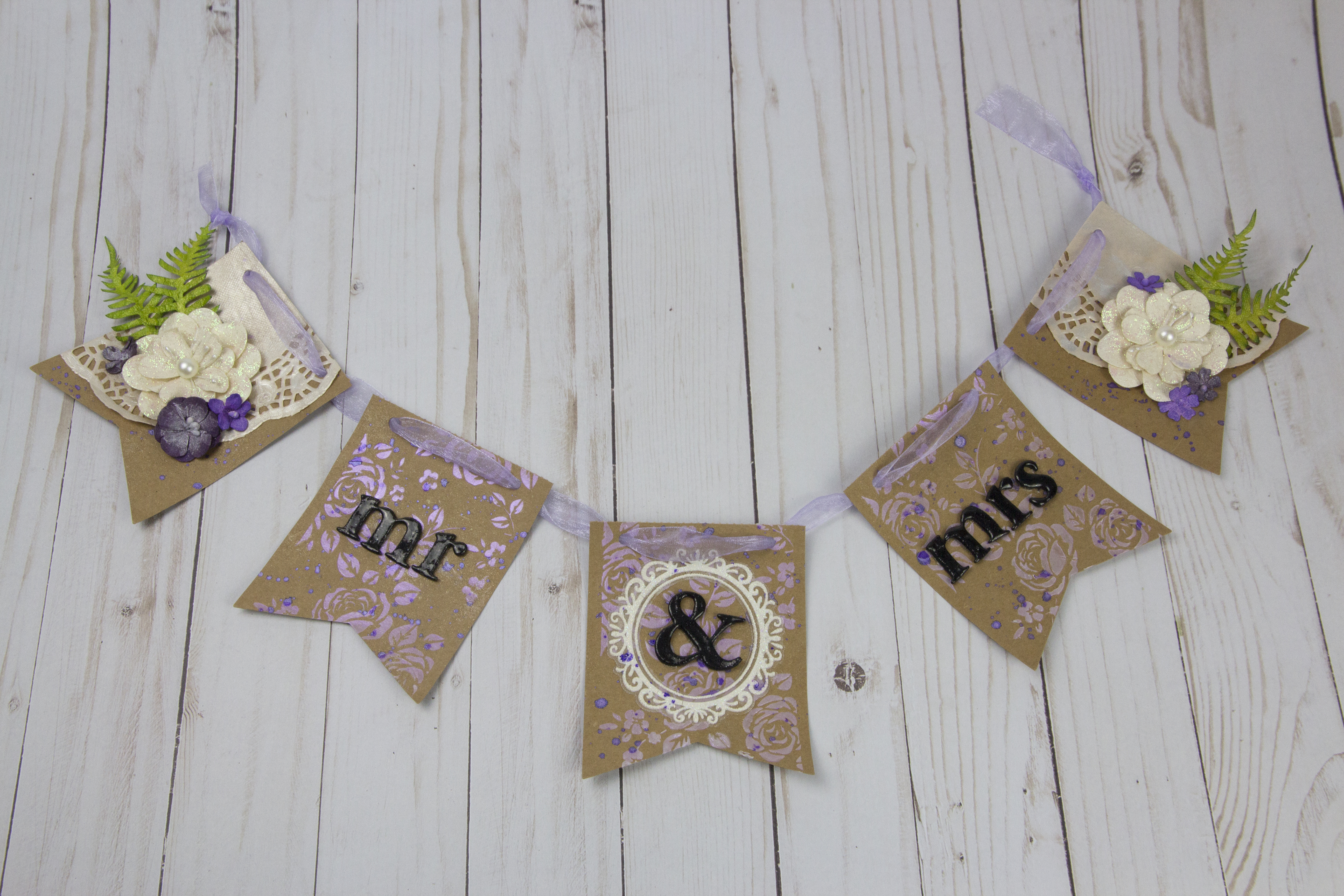A handmade paper banner with a 
